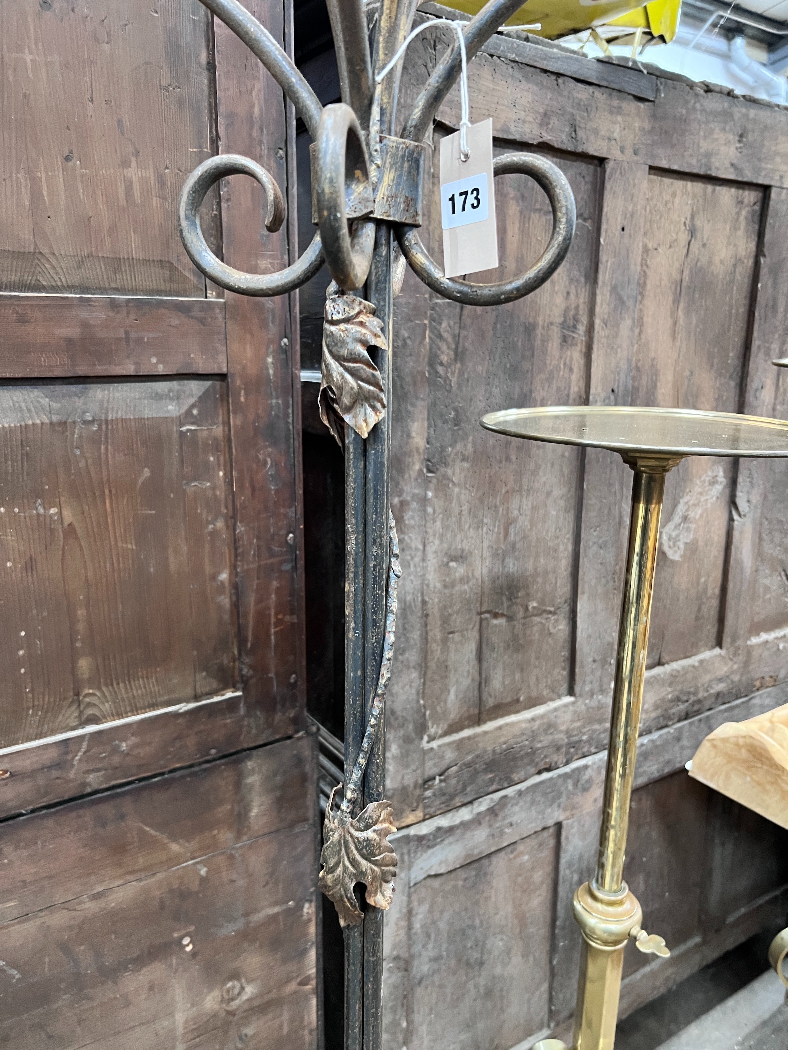 A wrought iron candelabrum lamp standard, height 187cm *Please note the sale commences at 9am.